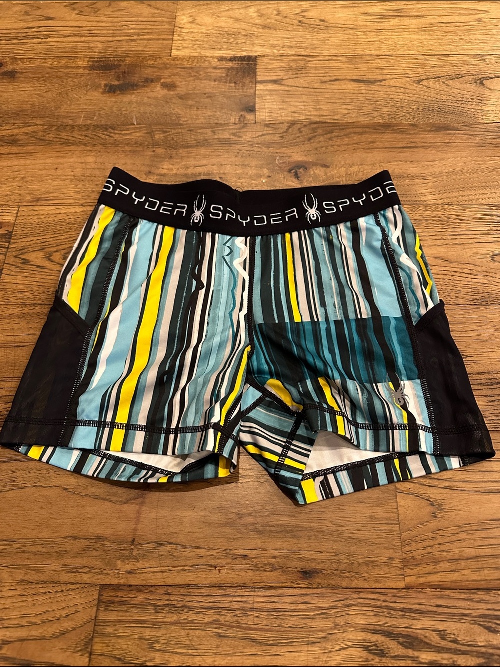 Spyder Multicolor Striped Active Shorts in Teal, Yellow & Black